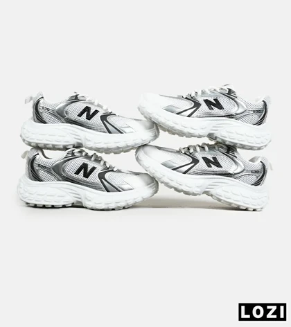 کفش کتانی مردانه و زنانه سفید طوسی مشکی NEW BALANCE 530 V02