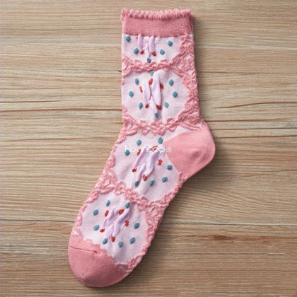 جوراب ساق‌دار گل‌گلی صورتی