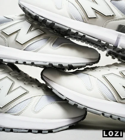 کفش کتانی سفید طوسی NEW BALANCE 1300
