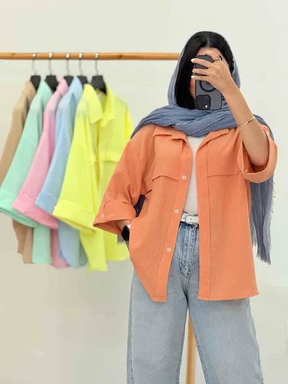 مانتو برش‌دار سر آستین دکمه