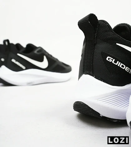 کفش کتانی بزرگ پا مشکی سفید Nike guide 10