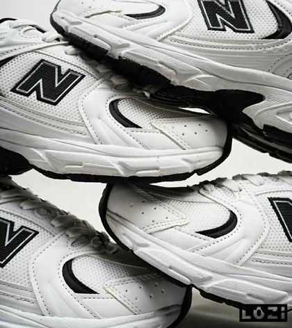 کفش کتانی مردانه و زنانه سفید مشکی NEW BALANCE 530 مدل 4974