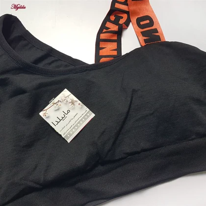 ست نیم‌تنه و شلوارک ورزشی زنانه مدل سیملس پشت چین‌دار کد 5562-2333