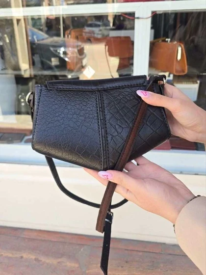 کیف چرم زنانه مثلثی مشکی سنگی چرم اصل گاوی