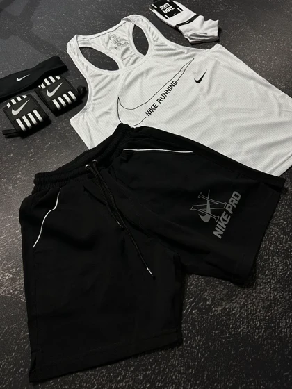 پکیج کد E1031 شامل رکابی + شلوارک + جوراب + هدبند + مچ بند با تم سفید مشکی🤍👌