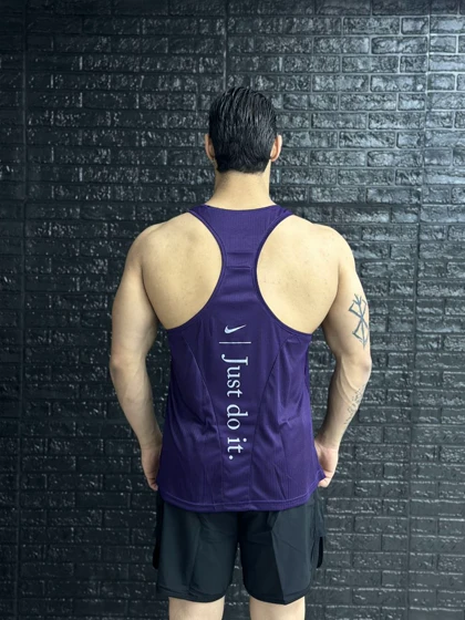 پکیج کد E1155 شامل رکابی + شلوارک نایکی با تم بنفش 💜👌