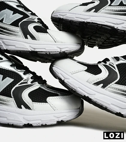 کفش کتانی مردانه و زنانه مشکی سفید NEW BALANCE 530