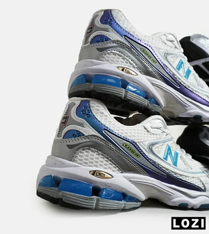 کفش کتانی مردانه و زنانه سفید طوسی آبی NEW BALANCE 1064 مدل 6312