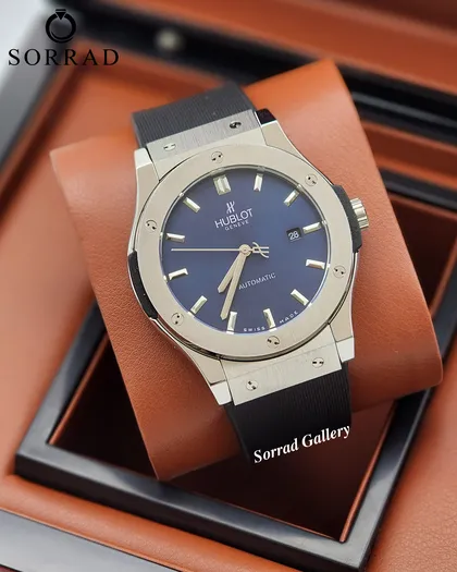 ساعت هابلوت مردانه / اتومات بند رابر رنگ مشکی صفحه سرمه ای-سیلور