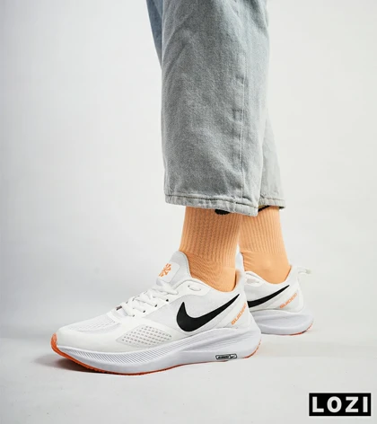 کفش کتانی مردانه سفید نارنجی Nike guide 10