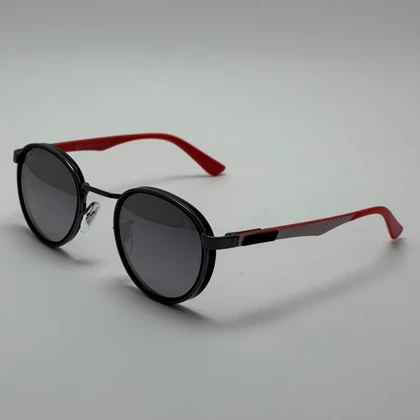 عینک آفتابی گرد ریبن فراری مشکی قرمز عدسی نقره ای دسته فیبر کربن به همراه پک کامل ریبن فراری و آچار