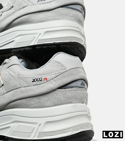 کفش کتانی بزرگ پا طوسی NEW BALANCE 2002R