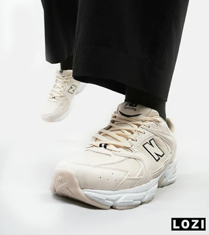 کفش کتانی مردانه و زنانه کرم NEW BALANCE 530