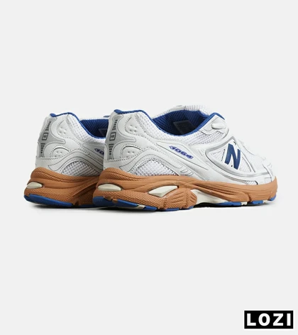 کفش کتانی مردانه و زنانه سفید آبی کرم NEW BALANCE 1064 V.2 مدل 7929