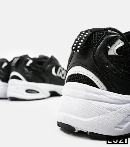 کفش کتانی زنانه و مردانه مشکی سفید NEW BALANCE 530