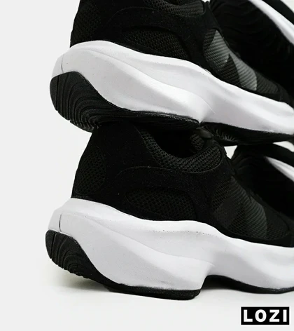 کفش کتانی مردانه مشکی سفید NEW BALANCE 547