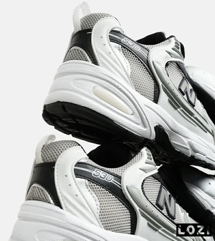 کفش کتانی مردانه و زنانه سفید طوسی مشکی NEW BALANCE 530 مدل 6642