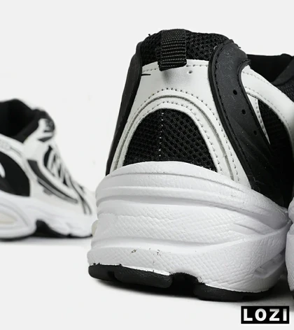 کفش کتانی مردانه و زنانه سفید مشکی NEW BALANCE 530