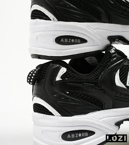 کفش کتانی زنانه و مردانه مشکی سفید NEW BALANCE 530 مدل 4124