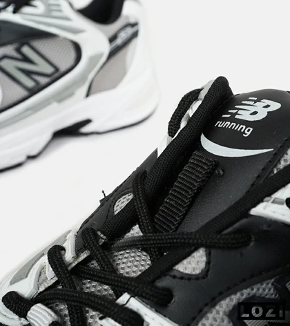 کفش کتانی مردانه و زنانه سفید طوسی مشکی NEW BALANCE 530 مدل 6642