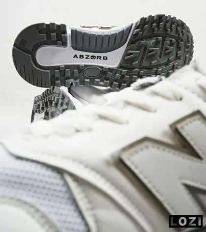 کفش کتانی سفید طوسی NEW BALANCE 1300