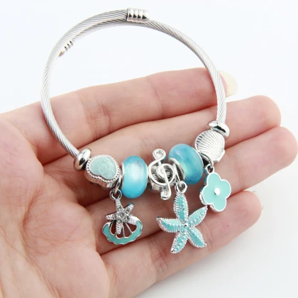 دستبند پاندورا مدل گل و ستاره دریایی