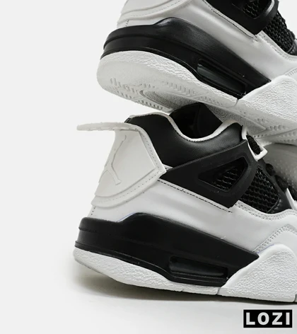 کتانی ساق‌دار بزرگ پا سفید مشکی Nike air jordan 4
