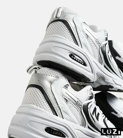 کفش کتانی مردانه و زنانه سفید مشکی NEW BALANCE 530
