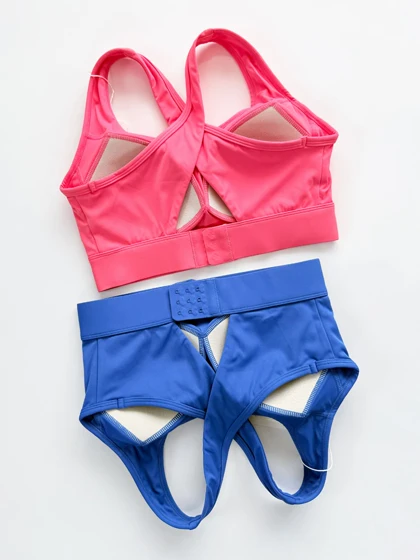 نیم‌تنه کاپ‌دار ورزشی حرفه ای قزن دار فلامنت بند ضربدری