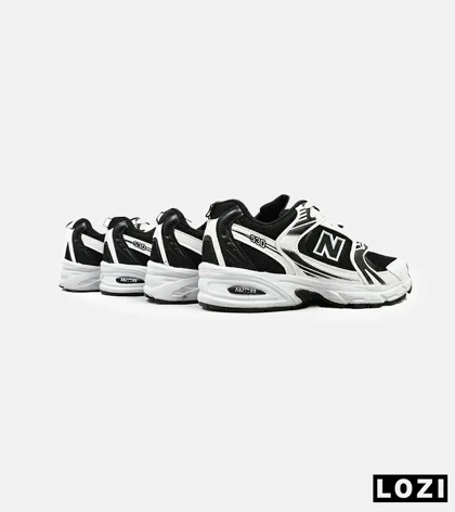 کفش کتانی مردانه و زنانه سفید مشکی NEW BALANCE 530