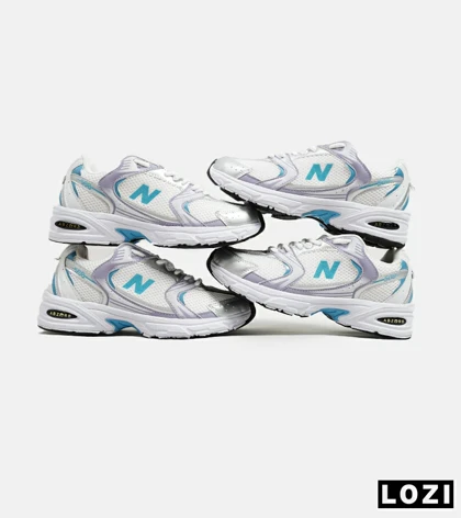 کفش کتانی مردانه و زنانه سفید آبی یاسی NEW BALANCE 530