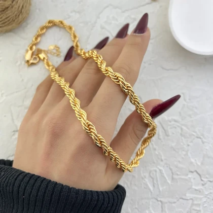 نیم‌ست زنانه مدل آئورلیا طرح طلا بافت طنابی (گردنبند، دستبند و گوشواره آویز)