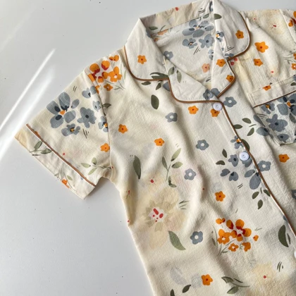 ست بلوز و شلوار راحتی موسلین طرح گل‌دار طوسی