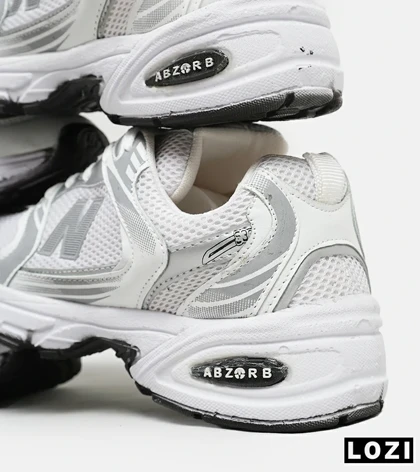 کفش کتانی مردانه و زنانه سفید طوسی نقره ای NEW BALANCE 530