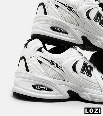 کفش کتانی مردانه و زنانه سفید مشکی NEW BALANCE 530 مدل 4974