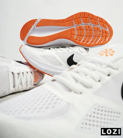 کفش کتانی مردانه سفید نارنجی Nike guide 10