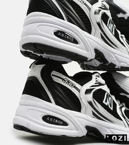 کفش کتانی مردانه و زنانه سفید مشکی NEW BALANCE 530