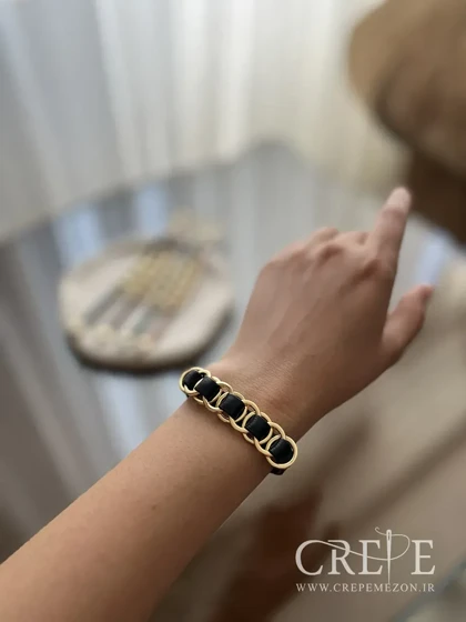 دستبند چرم طرح برند