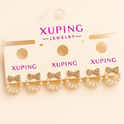 گوشواره طلایی پاپیونی با مروارید | مدل فانتزی و ظریف دخترانه