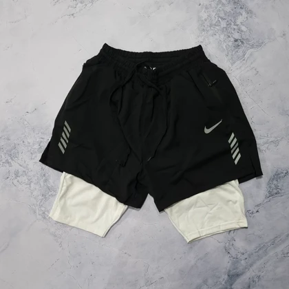 ست تاپ و شلوارک کشاله دار نایکی با 2 رنگ + جوراب