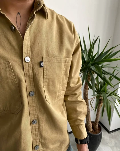 پیراهن دوجیب کتان آستین بلند بهاره ZARA رنگ خاکی
