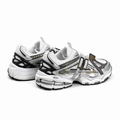 کتانی مردانه نیوبالانس 1906 طوسی مشکی طلایی New BALANCE 1906A