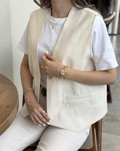 وست زنانه لینن کرم ساده