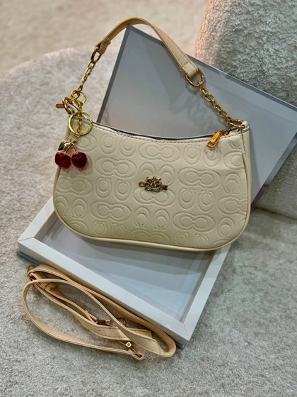 کیف دوشی و دستی دخترانه کوچ چاپدار