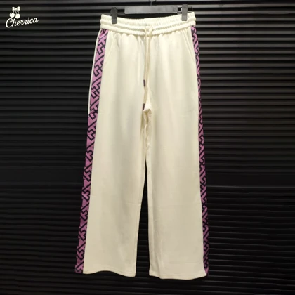 ست سویشرت و شلوار سفید و بنفش وارداتی زنانه کد 22