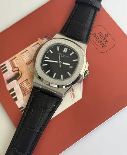 ساعت پتک فیلیپ ناتیلوس مردانه نقره ای بند چرم مشکی Patek Philippe Nautilus