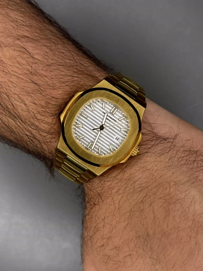 ساعت مچی پتک فیلیپ بند طلایی موتور اتوماتیک صفحه سفید Patek Philippe Nautilus