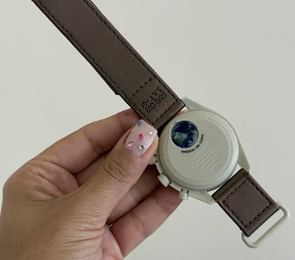 ساعت امگا سواچ زحل کرم قهوه ای Omega Swatch to Saturn