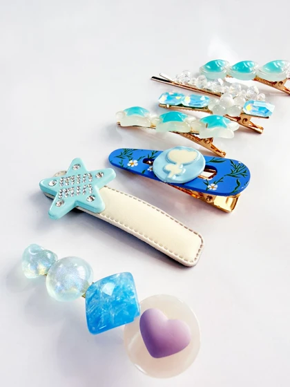 گیره مو طرح ستاره و قلب بسته هفت عددی