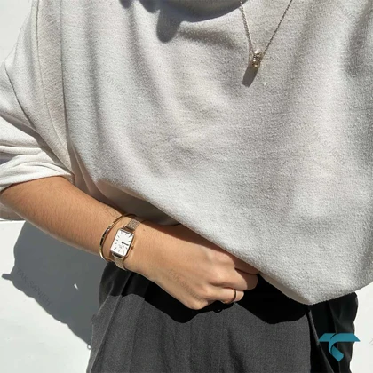 ساعت زنانه دنیل ولینگتون حصیری مستطیلی طلایی صفحه سفید DW-6646-L